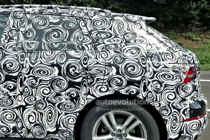 2018-audi-q3-spied-with-significantly-less-camo-over-its-production-ready-body_13.jpg