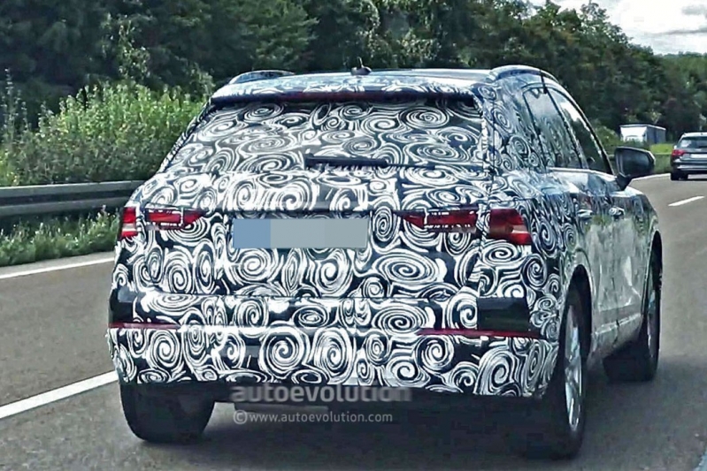 2018-audi-q3-spied-with-significantly-less-camo-over-its-production-ready-body_12.jpg